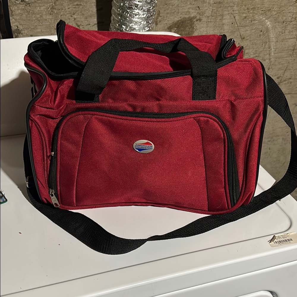 American Tourister Red and Black Duffel Bag Travel Essential